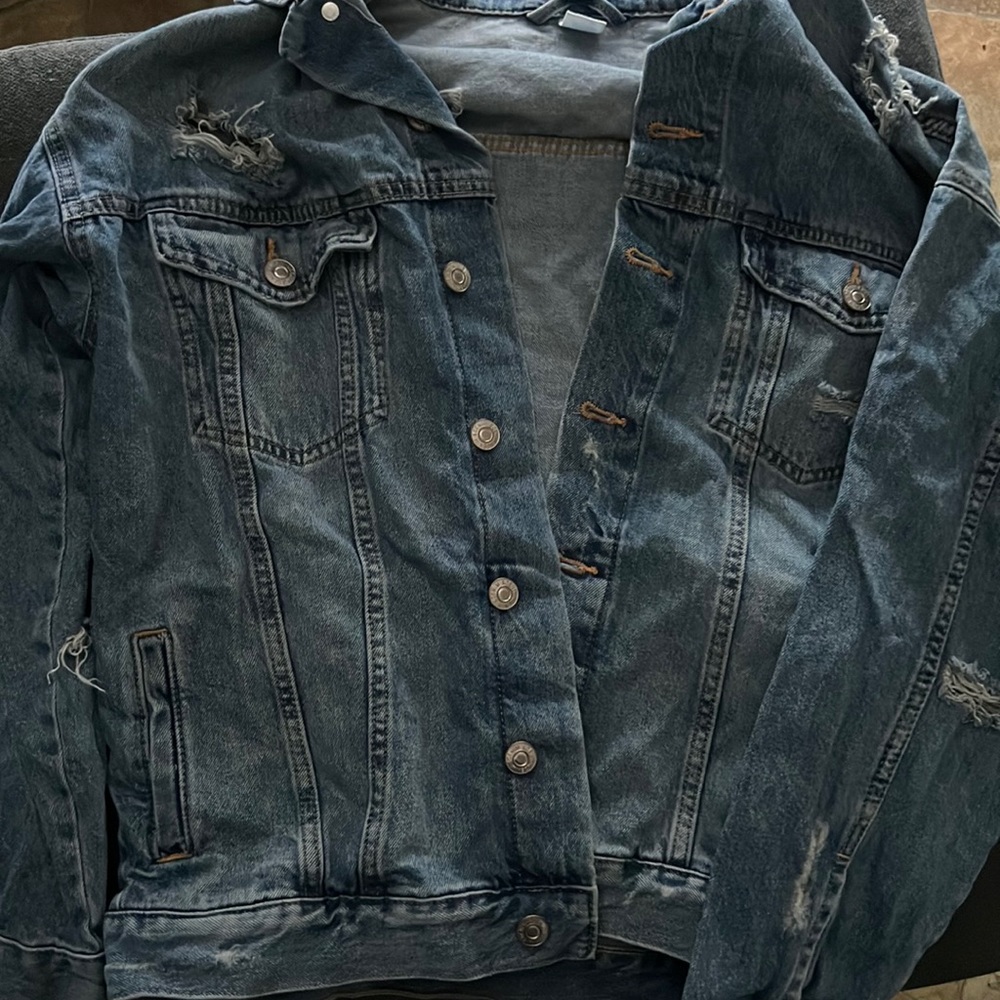 Ripped denim jacket